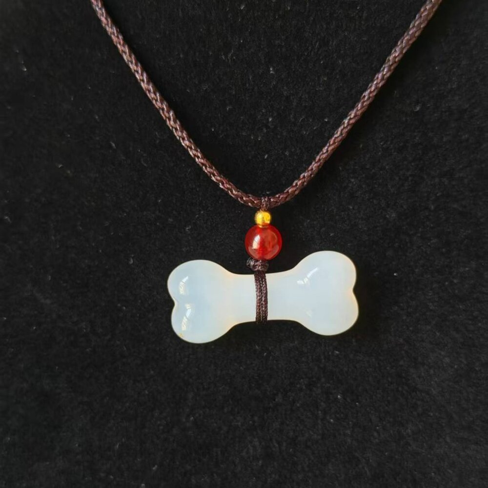Hand-Carved Natural Icy Translucent Jade Bone Pendant